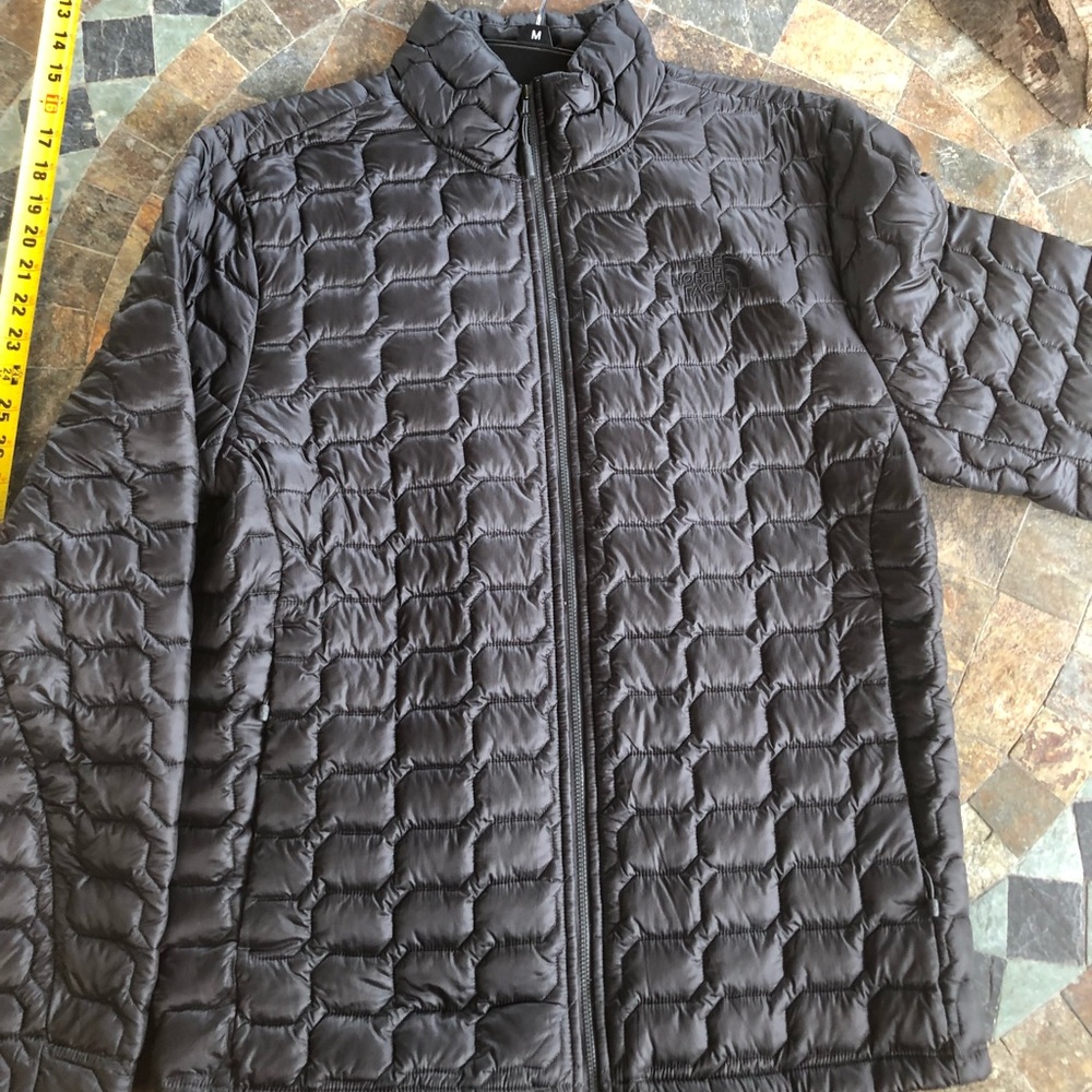 The North Face black puffer jacket. N/wo tags